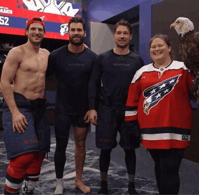 Woman In Washington Capitals Jersey Holding Bald Eagle GIF