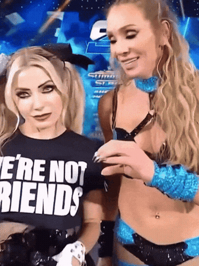Woman In We're Not Friends Shirt Next To Another Woman GIF