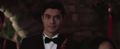 Woman In Wedding Dress Crying With Sparkler At Party GIF