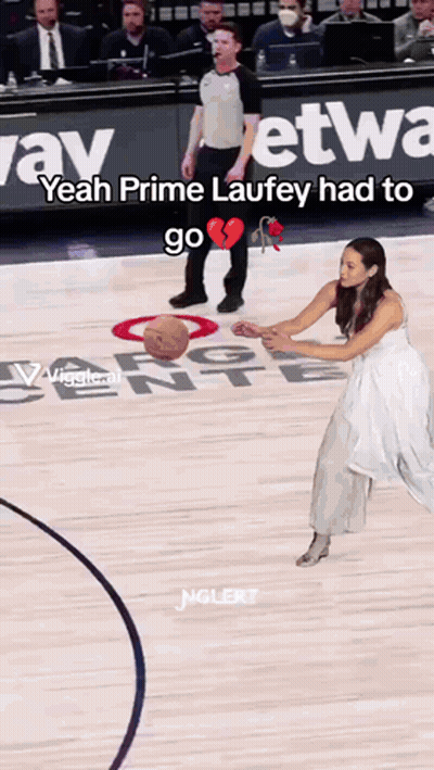 Woman In Wedding Dress Holding Basketball On Court GIF