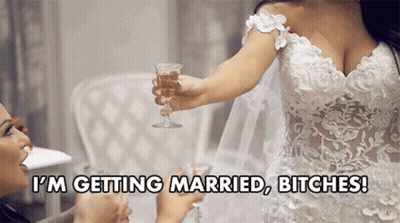 Woman In Wedding Dress Holding Champagne Says I'm Getting Married Bitches GIF