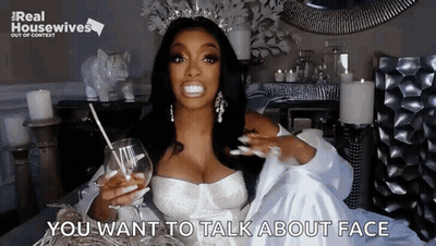 Woman In Wedding Dress Holding Glass Of Wine And Straw GIF