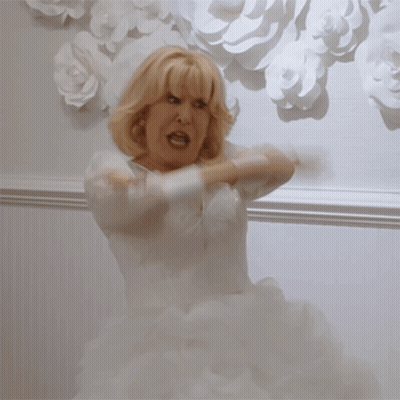 Woman In Wedding Dress Saying Gangsta Arms GIF