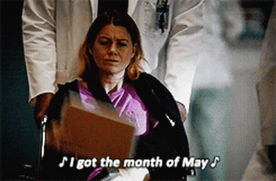 Woman In Wheelchair Being Pushed By Doctor GIF