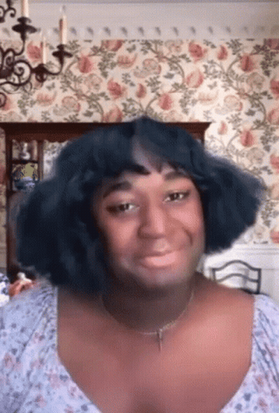 Woman In Wheelchair In Crowd GIF