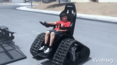 Woman In Wheelchair Riding Scooter In Restaurant GIF