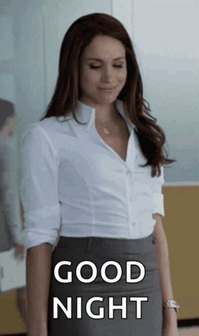 Woman In White And Gray At Window Saying Good Night GIF
