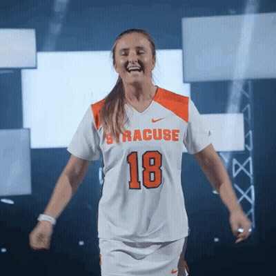 Woman In White And Orange Jersey Number 18 GIF
