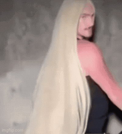 Woman In White And Orange Jersey Number 18 GIF