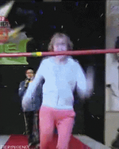 Woman In White And Pink Dancing In Fieryphoenix Ring GIF
