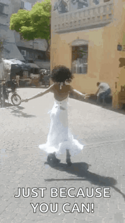 Woman In White Arms Outstretched Just Because You Can GIF