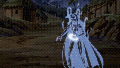Woman In White Cape Next To Bearded Man GIF