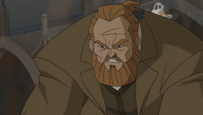 Woman In White Cape Standing Next To Bearded Man GIF