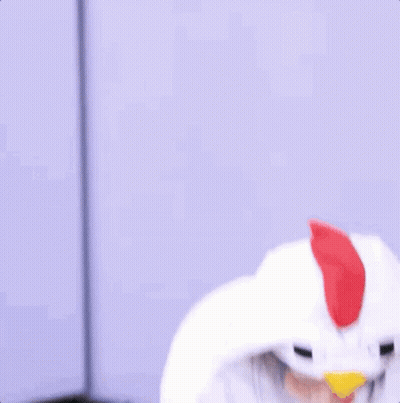 Woman In White Chicken Costume With Hood GIF