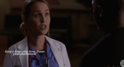 Woman In White Coat Talking To Man In Hospital Room GIF