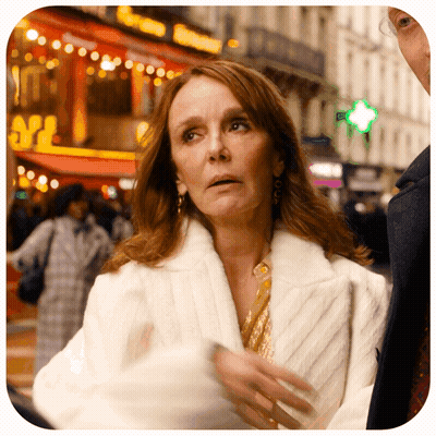 Woman In White Coat With M2 Sign GIF