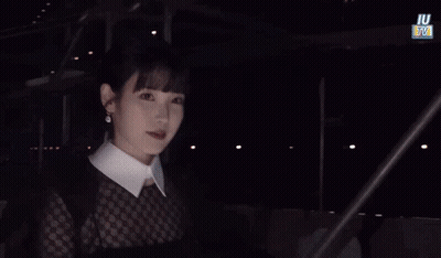 Woman In White Collared Shirt With IU TV Sign GIF