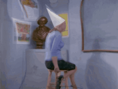 Woman In White Cone Hat Saying Ecru GIF