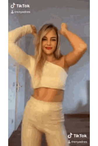 Woman In White Crop Top And Tan Pants Dancing TikTok Sticker