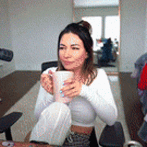 Woman In White Crop Top Holding Coffee GIF