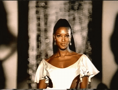 Woman In White Dress And Earrings GIF