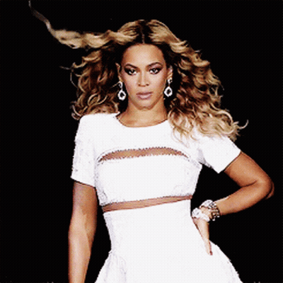 Woman In White Dress And Earrings Hand On Hip GIF