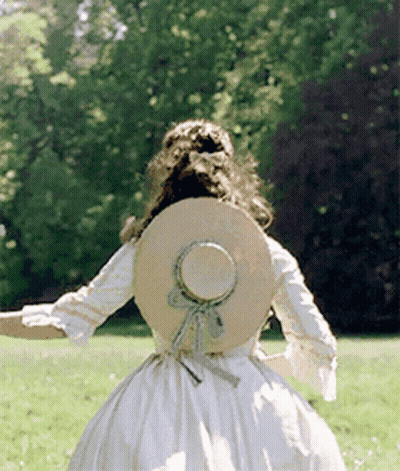 Woman In White Dress And Hat Running In Field GIF