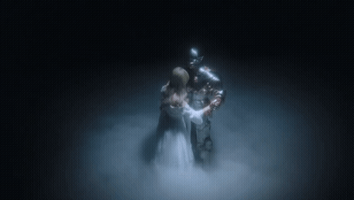 Woman In White Dress Beside Knight In Armor GIF