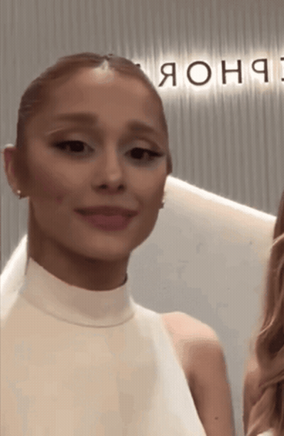 Woman In White Dress By Sign Saying Яоня GIF