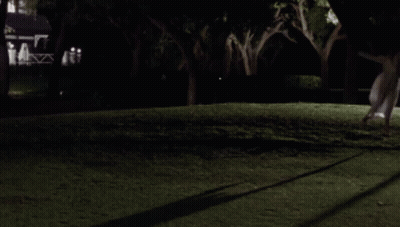 Woman In White Dress Dancing At Night GIF