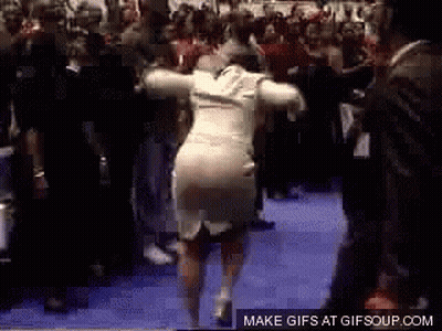 Woman In White Dress Dancing In Front Of Crowd GIF