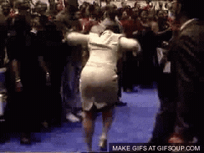 Woman In White Dress Dancing In Front Of Crowd GIF