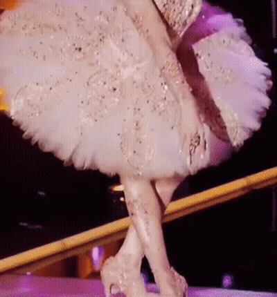 Woman In White Dress Dancing In Heels GIF