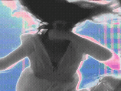 Woman In White Dress Dancing With Hair Flying GIF
