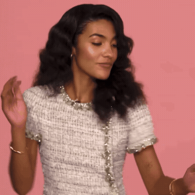 Woman In White Dress Dancing With Hands Up GIF