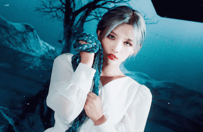 Woman In White Dress Holding Blue Rope GIF