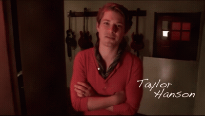 Woman In White Dress Holding Candle GIF