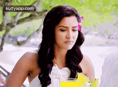 Woman In White Dress Holding Drink GIF