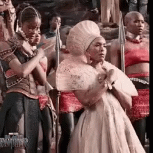 Woman In White Dress Holding Fan GIF