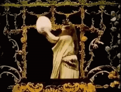 Woman In White Dress Holding Large White Object GIF