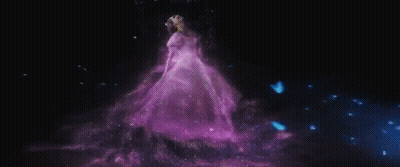 Woman In White Dress Holding Wand In Rain GIF