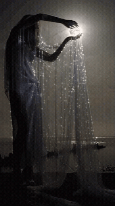 Woman In White Dress Holding White Cloth In Dark GIF