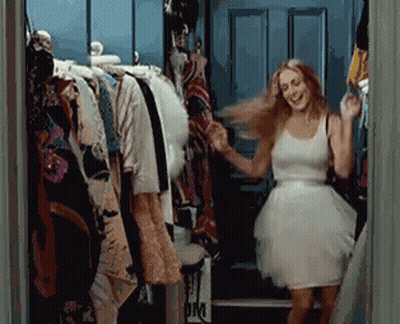 Woman In White Dress In Closet GIF