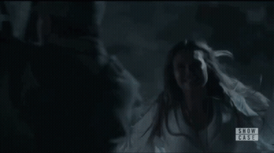 Woman In White Dress In Dark Room Show Case GIF