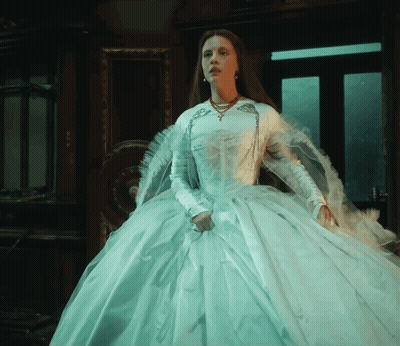 Woman In White Dress In Front Of Mirror GIF