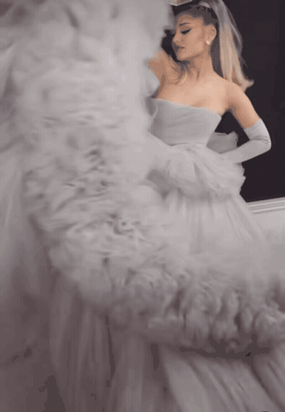 Woman In White Dress Looking In Mirror GIF