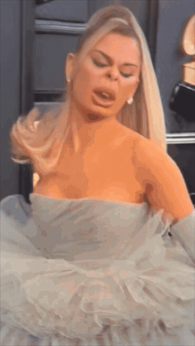 Woman In White Dress Making Face GIF