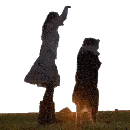 Woman in White Dress Next to Dog