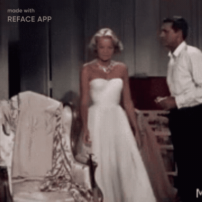 Woman In White Dress Next To Man In Tuxedo GIF
