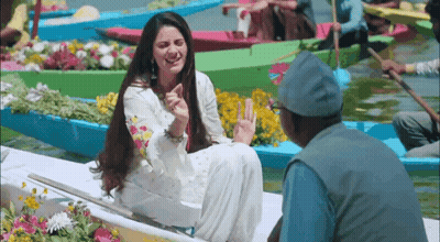 Woman In White Dress On Boat With Man GIF